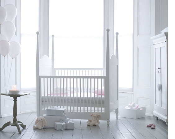 white modern baby crib