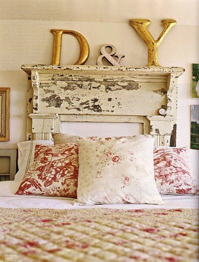 DIY headboard distressed mantlepiece white bedroom feature wall Via Feather and Branch