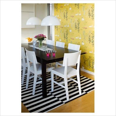 Black white yellow dining room rug Via Gap Interiors