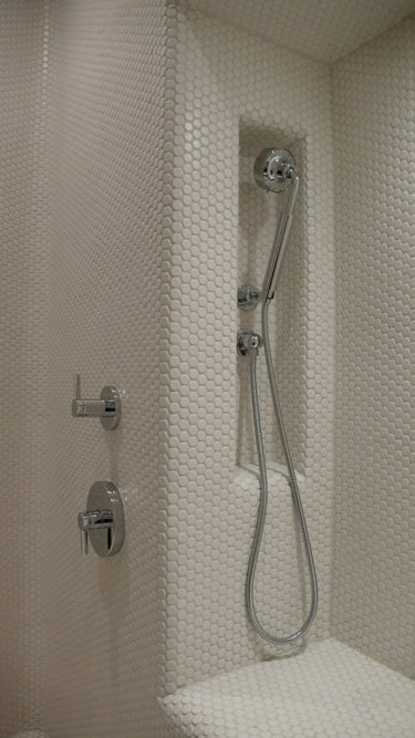 white hexagonal mosaic tile shower room Via Desire to Inspire