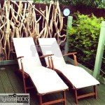 Reclaimed driftwood fence sunloungers