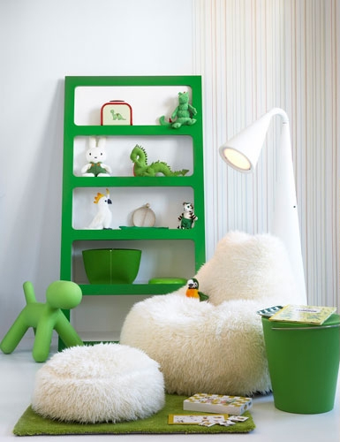unisex boys girls kids room childrens bedroom childs green shelves white fur chair footstool play area