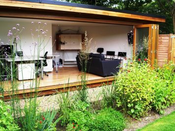 Full glass front bifold doors garden studio