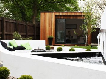 Contemporary garden studio room concrete seating water feature