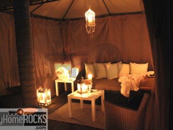semi permanent outdoor room candle lanterns cushions
